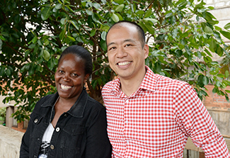 Dr. Margaret Kasaro (left) and Dr. Benjamin Chi (right), smiling