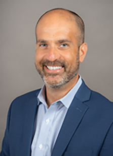 Headshot of Dror Ben Zeev