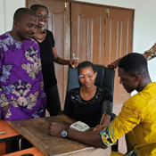 Halimatou Alaofè training dieticians to measure blood pressure