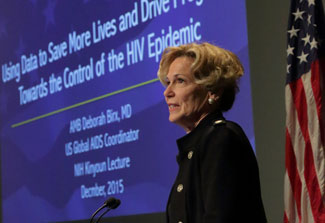 Dr Deborah Birx speaks at a podium at NIH
