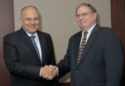 Egypt science minister Dr. Amr Salama shakes hands with NIH principal deputy director Dr. Lawrence Tabak