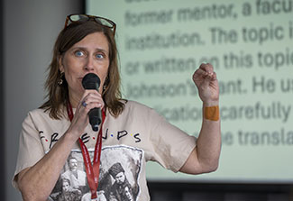 Emily Anderson speaking with microphone