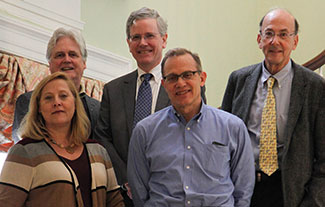 Fogarty Director Dr. Roger Glass poses with 4 new advisory board members