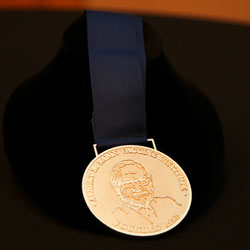 A close up of the Sabin Gold Medal