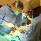 Dr. Hannah Wild and Colonel Bassinga in the operating room