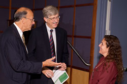 PHOTO: Dr. Roger I. Glass, Director Dr. Francis Collins, and Dr. Patricia Garcia, all smiling, speak together.